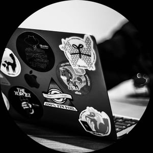 Round - laptop with stickers